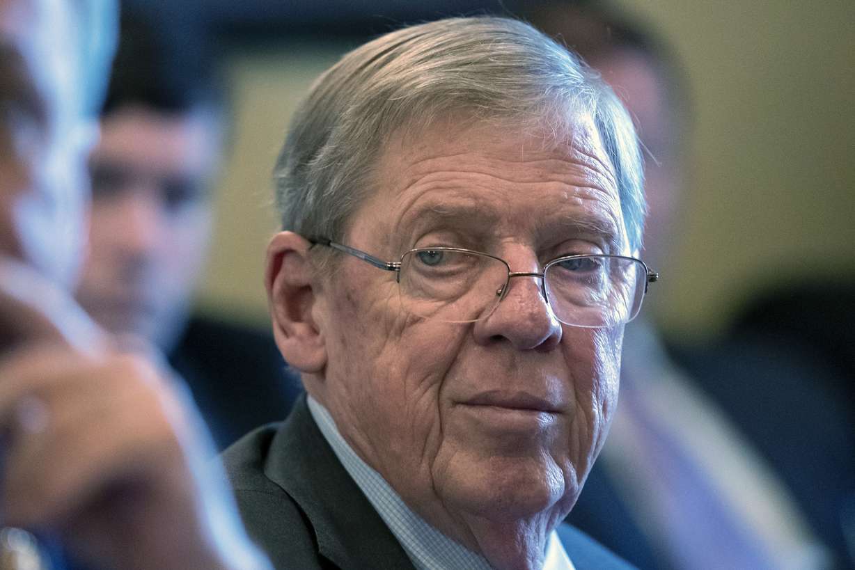In this Feb. 14, 2019 photo, Sen. Johnny Isakson, R-Ga., leads a meeting on Capitol Hill in Washington. Isakson, an affable Georgia Republican politician who rose from the ranks of the state Legislature to become a U.S. senator, has died. He was 76. Georgia Gov. Brian Kemp’s office confirmed the death in a news release Sunday, Dec. 19, 2021.