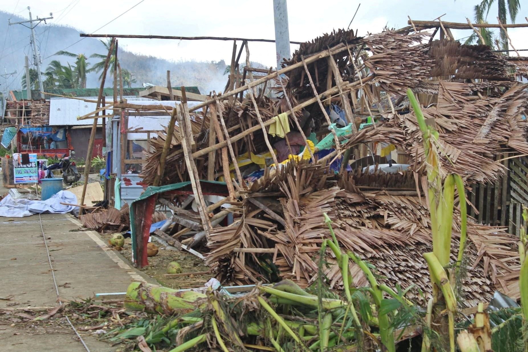 Houses damaged by typhoon Rai are seen, in Surigao del Norte province, Philippines, Saturday.