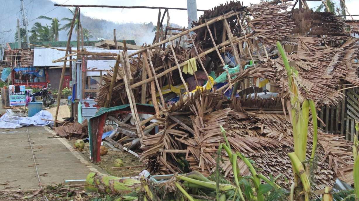 Houses damaged by typhoon Rai are seen, in Surigao del Norte province, Philippines, Saturday.
