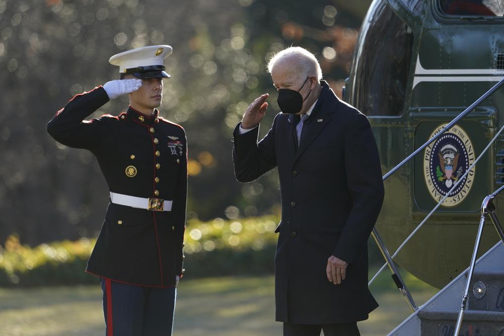 President Joe Biden salutes as he steps off Marine One on the South Lawn of the White House in Washington, Monday. Biden is returning to Washington after spending the weekend at his home in Delaware.
