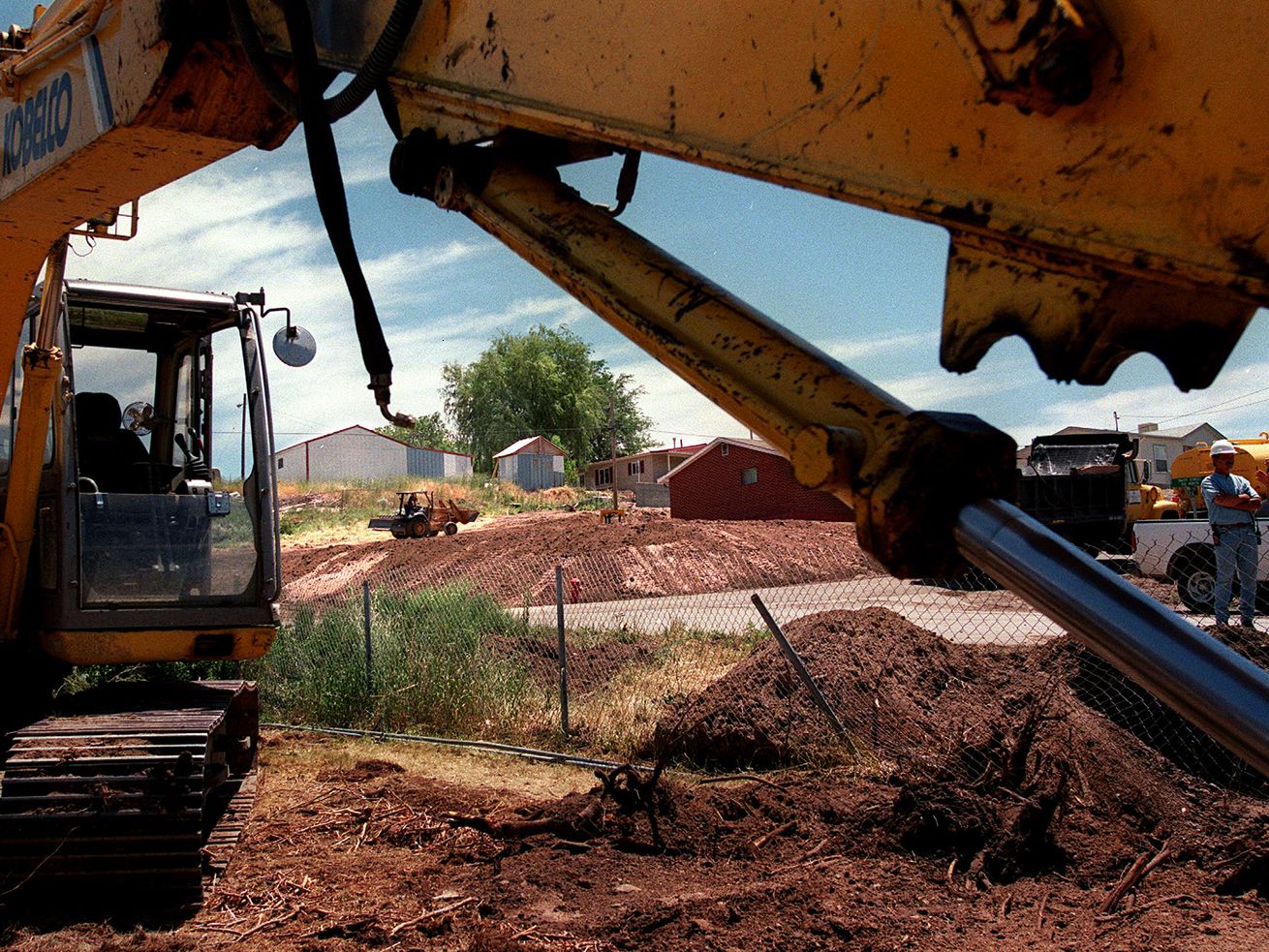Environmental Chemical Corporation is pictured in this
June 1999 file photo cleaning up in the town of Stockton, Tooele
County, near a toxic superfund site.