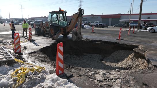 A West Valley City street is starting to look like normal again after a sinkhole took out a huge chunk of the road Sunday afternoon.