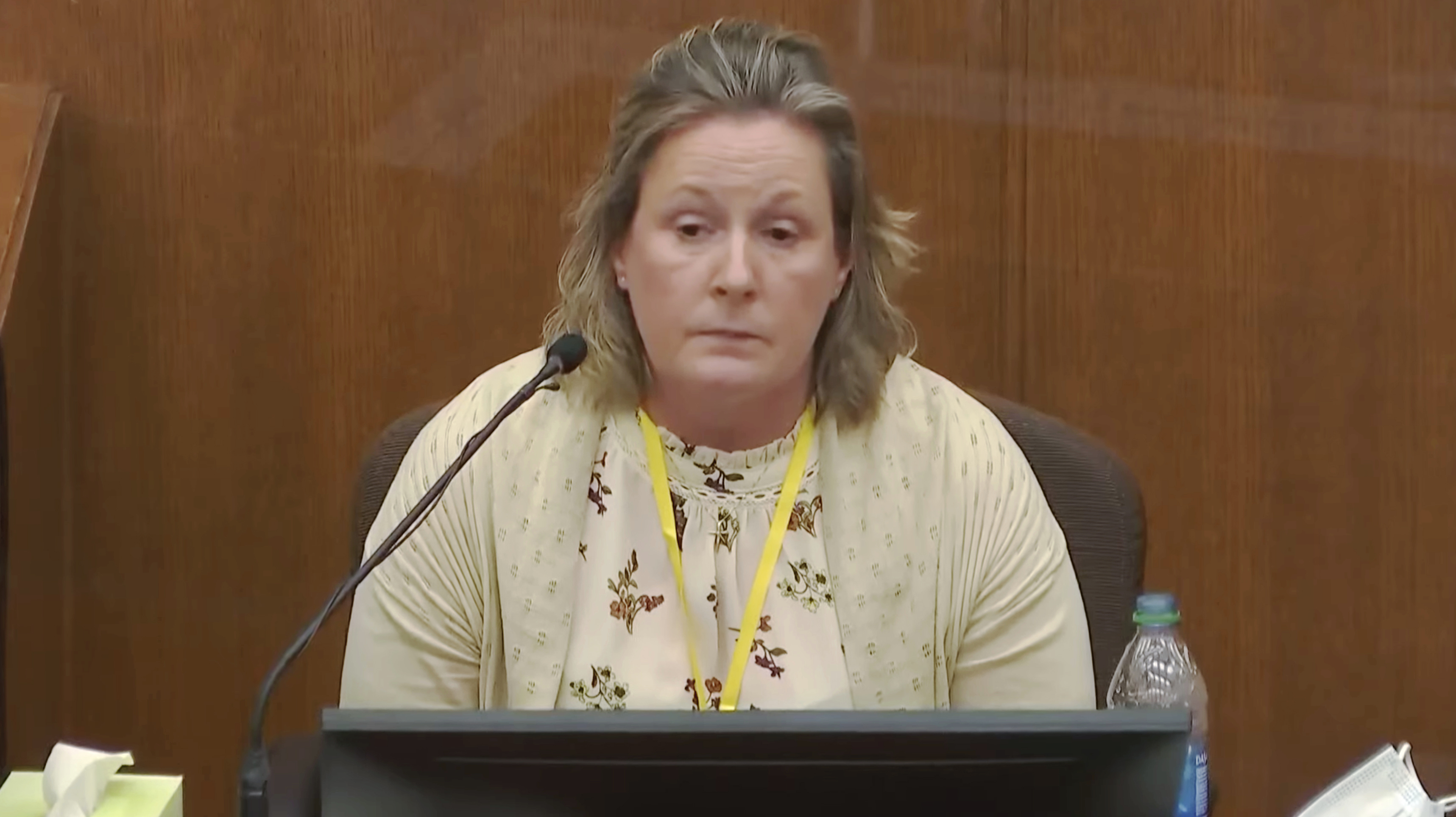 Former Brooklyn Center Police Officer Kim Potter takes questions from the prosecution as she testifies in court Friday in Minneapolis, Minn. Potter is charged with first and second-degree manslaughter in the April 11 shooting of Daunte Wright, a 20-year-old Black motorist.