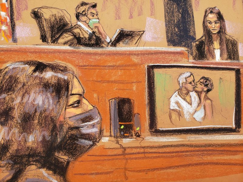 A photo of Ghislaine Maxwell and Jeffrey Epstein is shown as FBI analyst Kimberly Meder testifies during the trial of Maxwell, the Jeffrey Epstein associate accused of sex trafficking, in a courtroom sketch in New York City, Dec. 7. On Tuesday, the jury asked to review transcripts of the testimony of three of her accusers.