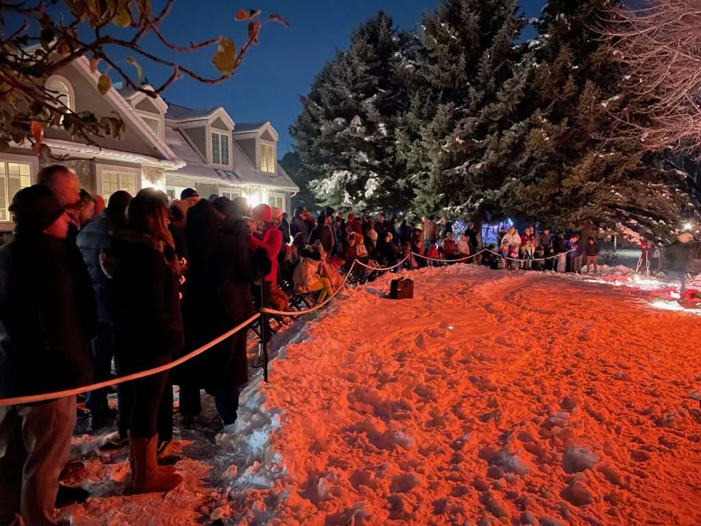 Friends and strangers wait to see a nativity pageant in Cottonwood Heights Monday. The Tuttle family estimates a few hundred people come to watch their pageant every year.