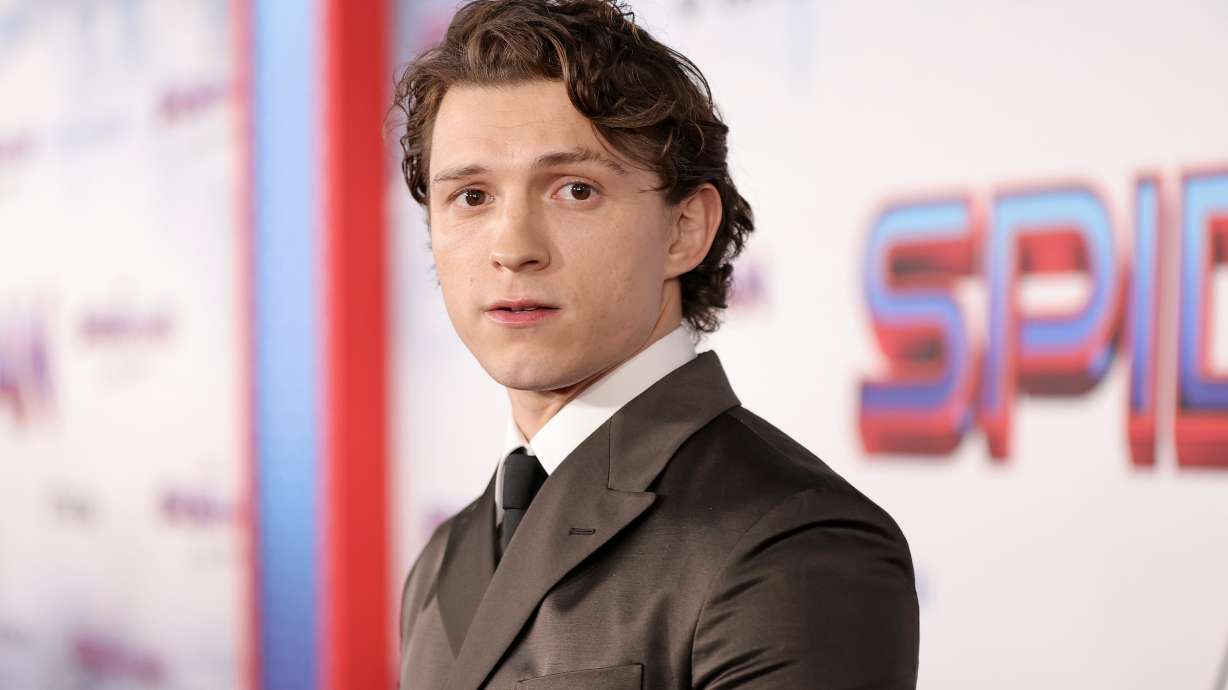 Tom Holland promised a little boy who saved his sister from a dog attack in 2020 that the young Spider-Man fan could visit the "Spider-Man: No Way Home" set and he did just that.