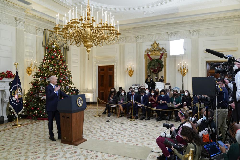 President Joe Biden speaks about the COVID-19 response and vaccinations, Tuesday in the State Dining Room of the White House in Washington.