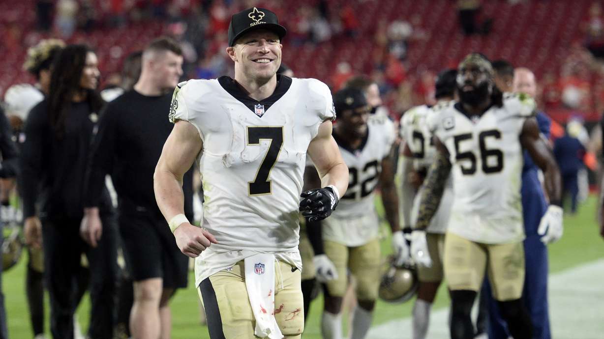 New Orleans Saints quarterback Taysom Hill (7) smiles as he leaves the field after the team defeated the Tampa Bay Buccaneers during an NFL football game Sunday, Dec. 19, 2021, in Tampa, Fla.