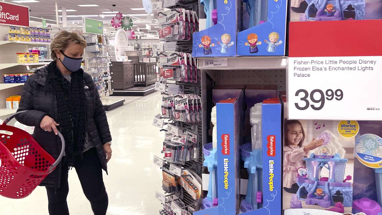 A shopper shops at a retail store in Glenview, Ill., Dec. 16. The National Retail federation said this month that the holiday shopping season appears to be on pace to exceed its sales growth forecast of between 8.5% and 10.5%.