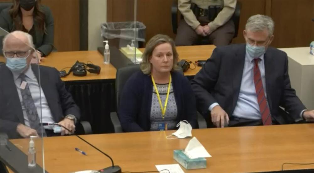 Former Brooklyn Center police Officer Kim Potter, center, listens as Hennepin County Judge Regina Chu pools the jury after the verdict on Thursday at the Hennepin County Courthouse in Minneapolis, Minn. Jurors on Thursday convicted Potter of two manslaughter charges in the killing of Daunte Wright, a Black motorist she shot during a traffic stop after she said she confused her gun for her Taser.