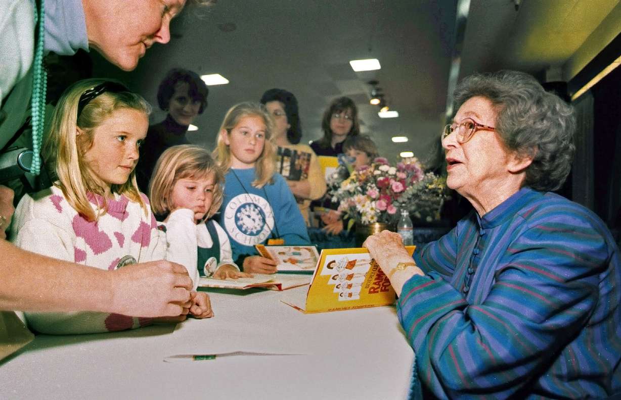 Beverly Cleary signs books at the Monterey Bay Book Festival in Monterey, Calif., April 19, 1998. Cleary, who died March 25, 2021, channeled memories from her youth in Oregon to created beloved characters such as Ramona Quimby, her sister Beatrice “Beezus” Quimby and Henry Huggins.