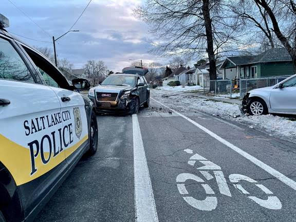 Salt Lake police arrested a man they say crashed a stolen SUV, fled from officers and attempted to carjack a vehicle.