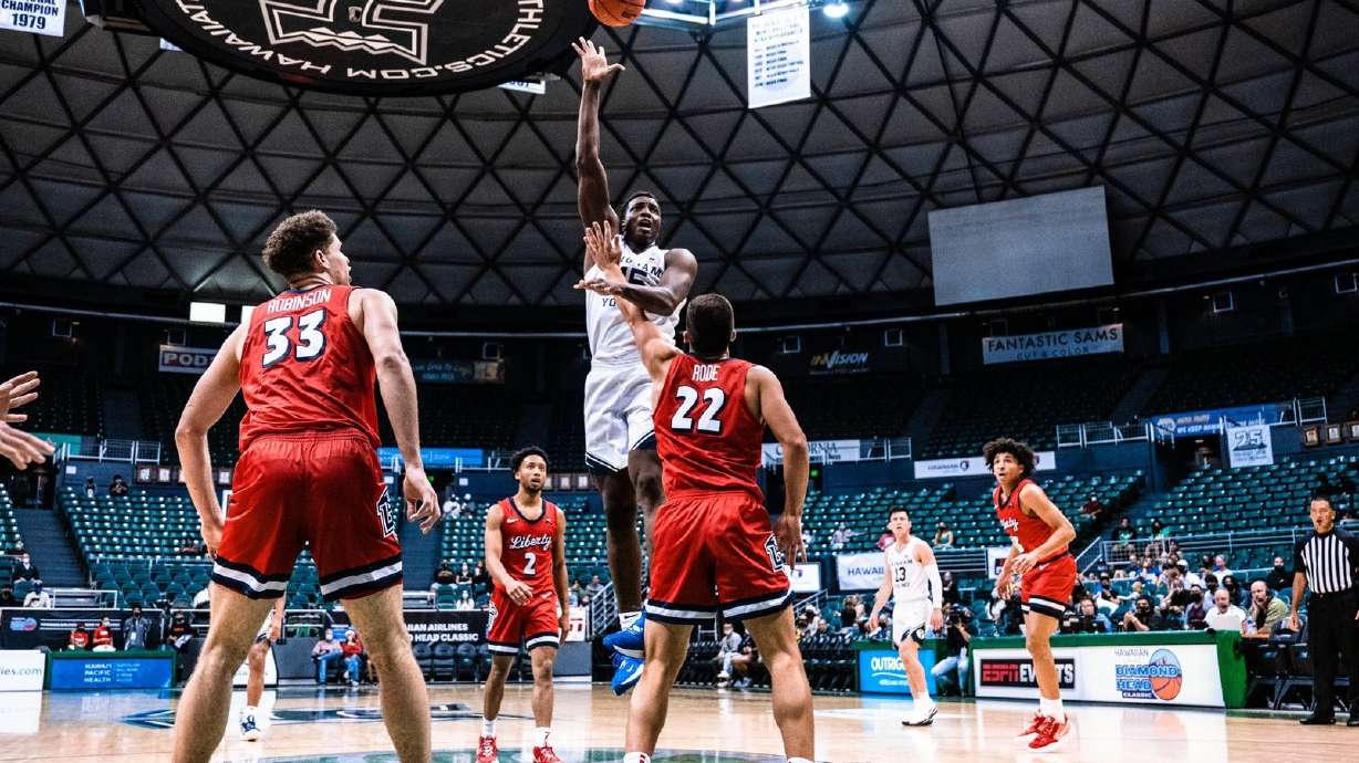 BYU center Fousseyni Traore had a career-high 19 points and 13 rebounds in his first career start, Saturday, Dec. 25, 2021 against Liberty in the Diamond Head Classic in Honolulu, Hawaii.