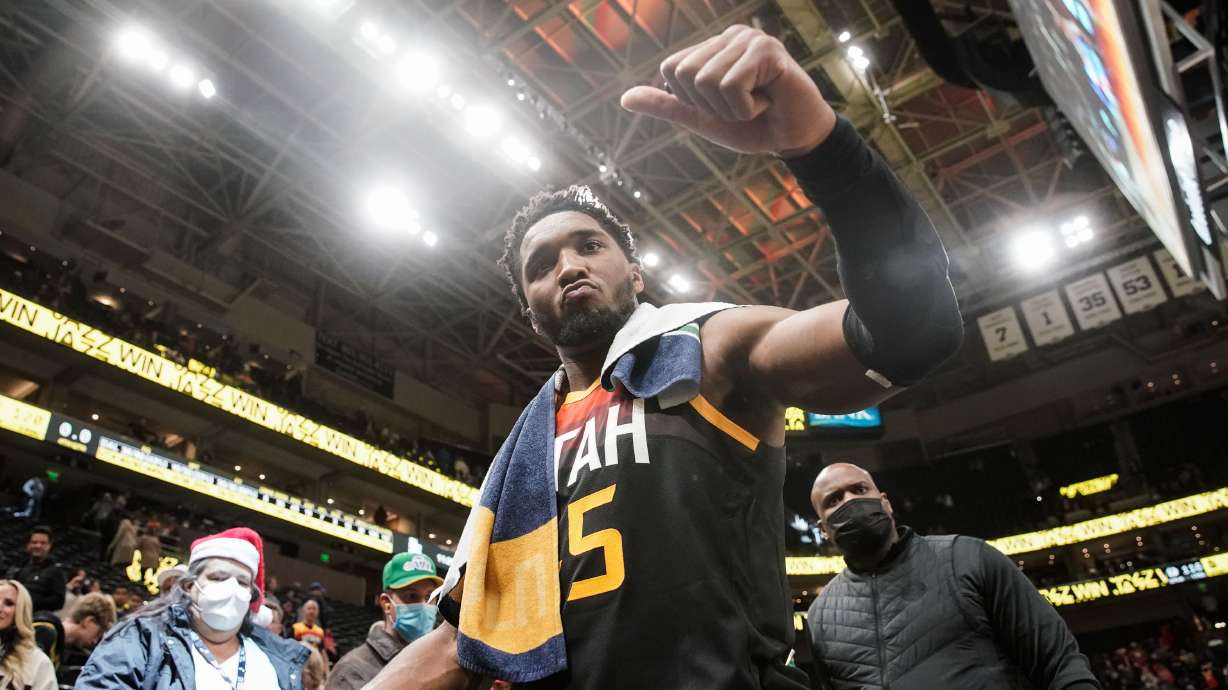 Utah Jazz guard Donovan Mitchell (45) leaves the court after winning against Dallas Mavericks during an NBA game at Vivint Arena in Salt Lake City on Saturday, Dec. 25, 2021.