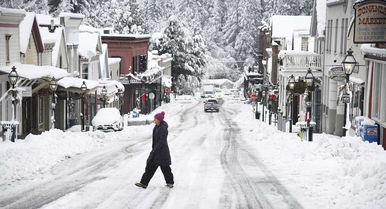 While snowfall was picturesque in places such as along Broad Street in Nevada City, Calif., it was dangerous for many others who were without electricity or stuck in the snow.