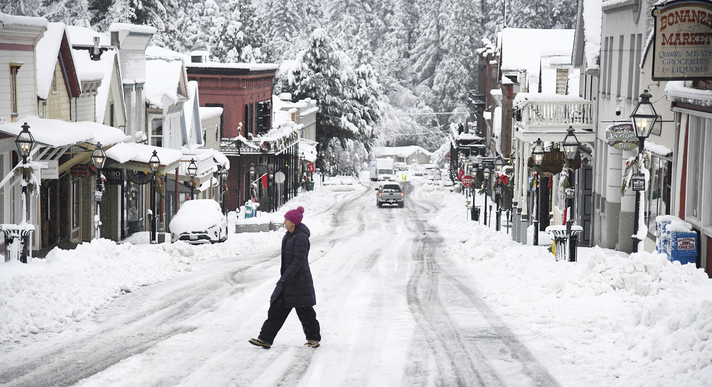 Snow lines the streets in Nevada City, California, on Monday.