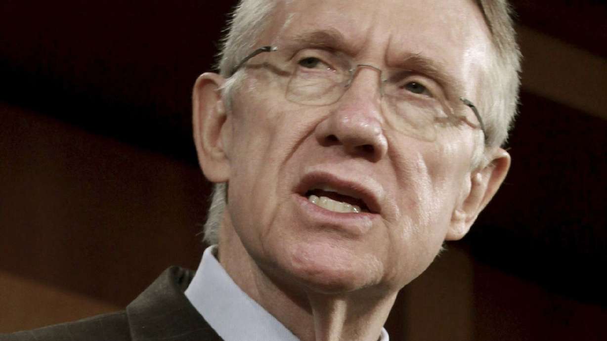 In this Feb. 25, 2009 file photo, Senate Majority Leader Harry Reid of Nev., talks with reporters on Capitol Hill in Washington. Reid died at the age of 82 on Tuesday, Dec. 28, 2021.