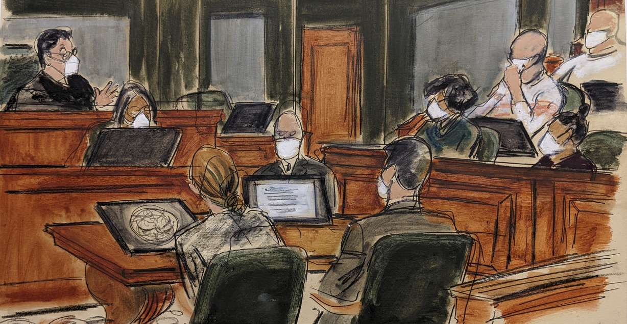 In this courtroom sketch, Judge Alison Nathan, far left, speaks to the jury, right, about the new deliberations schedule and the courts concern regarding the recent COVID-19 outbreak during the Ghislaine Maxwell sexual abuse trial, Tuesday, in New York.