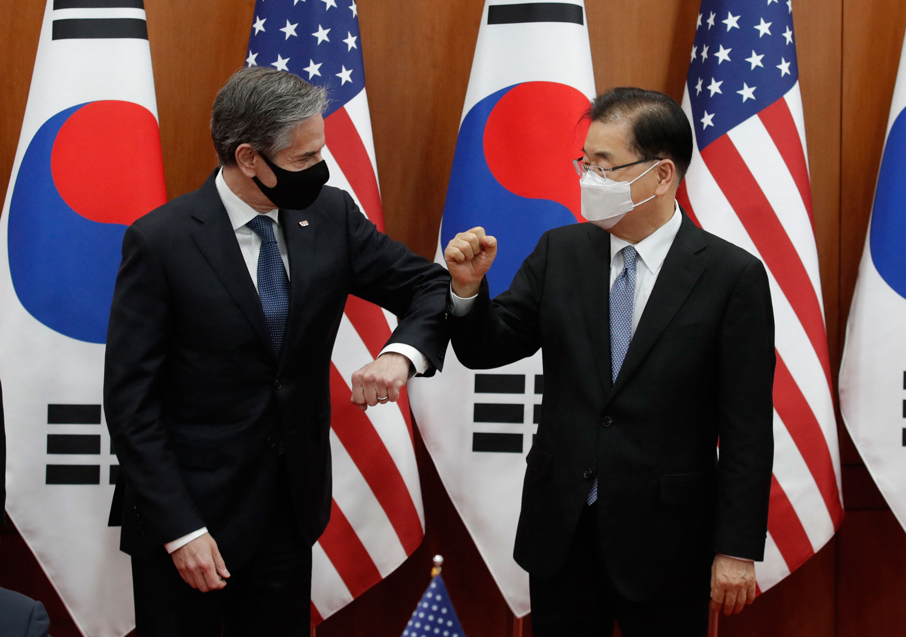 U.S. Secretary of State Antony Blinken, left, bumps elbows with South Korean Foreign Minister Chung Eui-yong in Seoul on March 18.