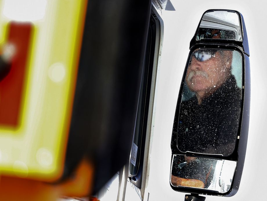 Dewey Edwards, equipment operator for Wasatch Front Waste & Recycling District, collects recycling in Herriman on Wednesday. Edwards collects recycling from approximately 1,000 cans a day.