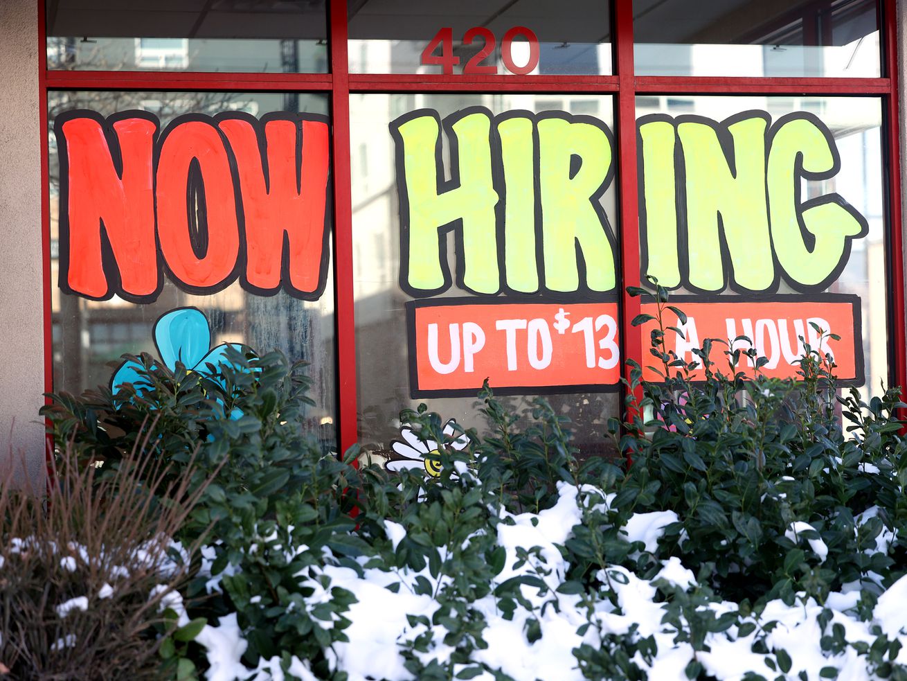 A "now hiring” sign at an Arby’s in Salt Lake City on
Thursday, advertises wages of up to $13 per hour.