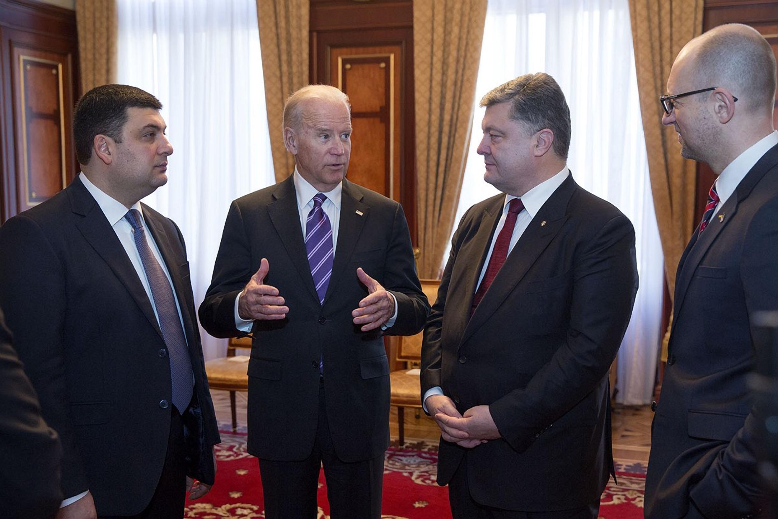 Then-Vice President Joe Biden talks with (from left) Volodymyr Groysman, speaker of the Rada, President Petro Poroshenko, and Prime Minister Arseniy Yatsenyuk, before addressing a session of the Rada Dec. 8, 2015, in Kyiv, Ukraine. Biden will speak with Ukrainian President Volodymyr Zelensky on Sunday.