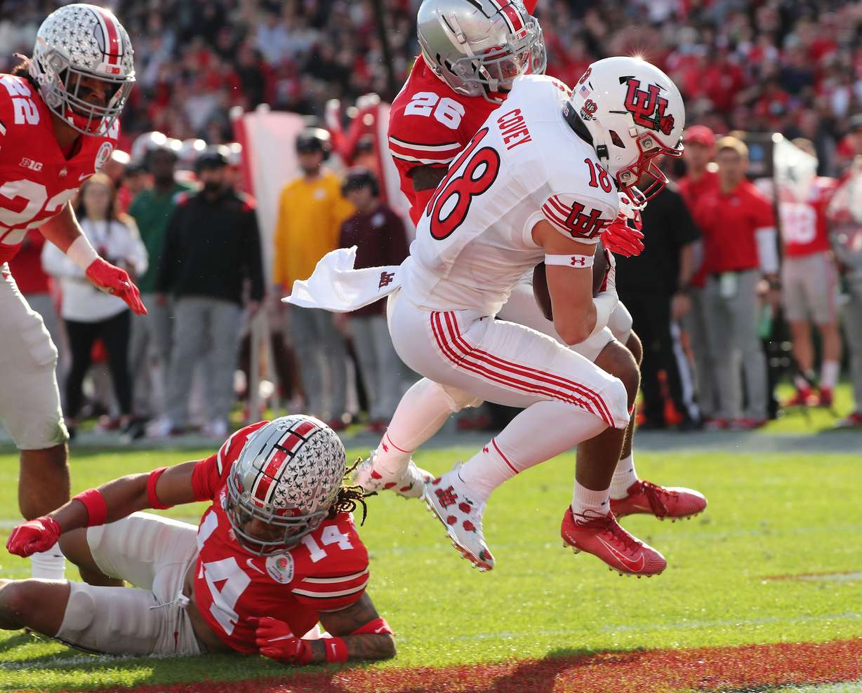Utah Utes wide receiver Britain Covey (18) scores a touchdown during the Rose Bowl in Pasadena on Saturday, Jan. 1, 2022. Utah led 35-21 at half before falling 48-45 in its first-ever Rose Bowl appearance.