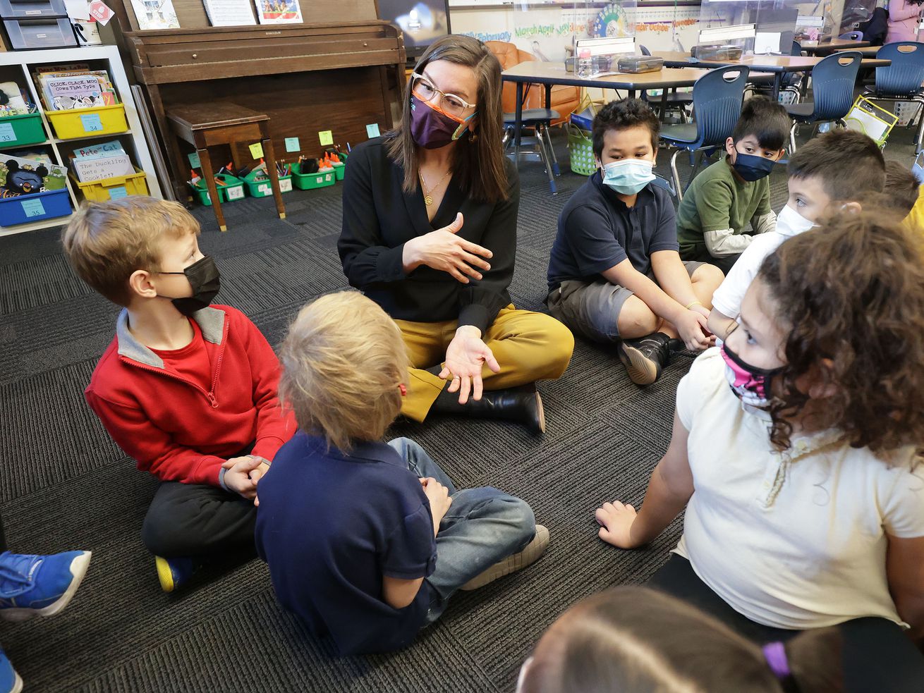 Salt Lake Mayor Erin Mendenhall talks with second graders at North Star Elementary School after reading to them in
Salt Lake City on Dec. 14, 2021.
