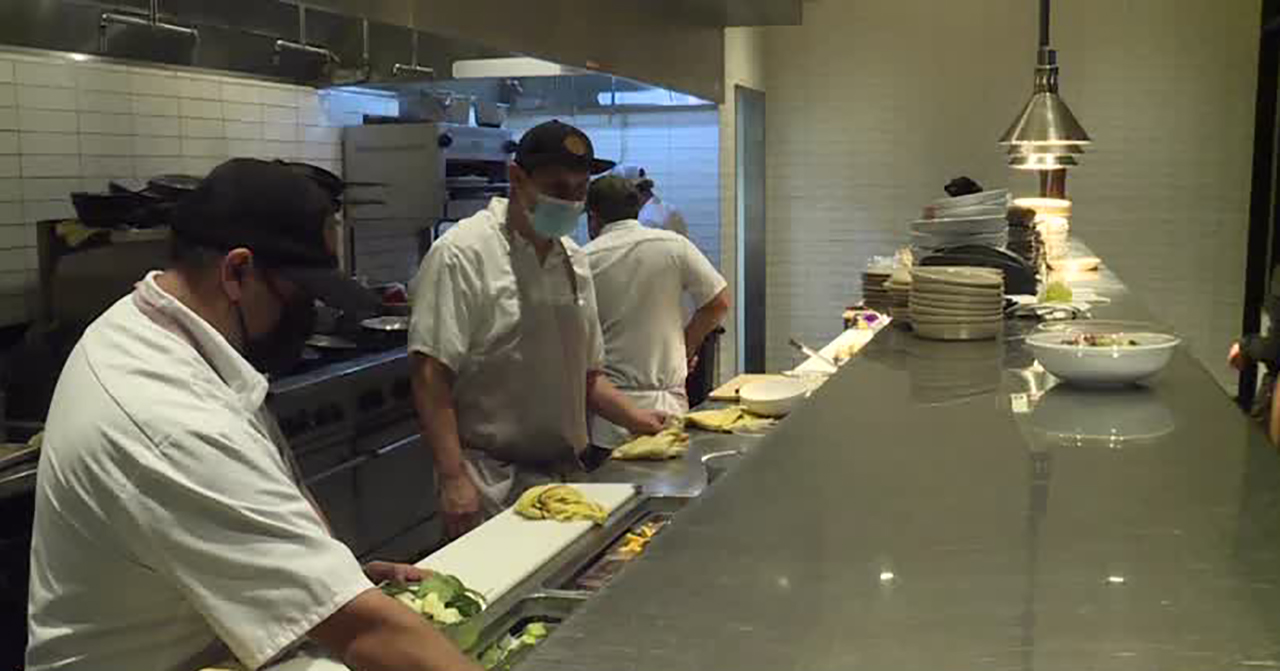 Employees work at the Hearth and Hill restaurant in Kimball Junction Monday. Restaurants are already taking countermeasures or plotting their next steps in the coming weeks amid a new pandemic surge.