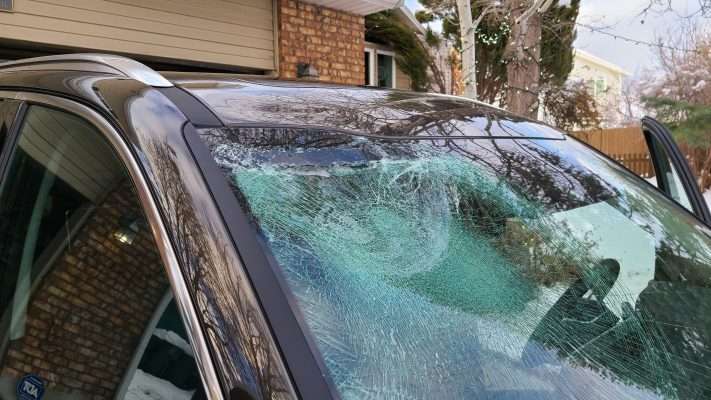 Marcin Karpinski's car was damaged by falling ice on Interstate 15.