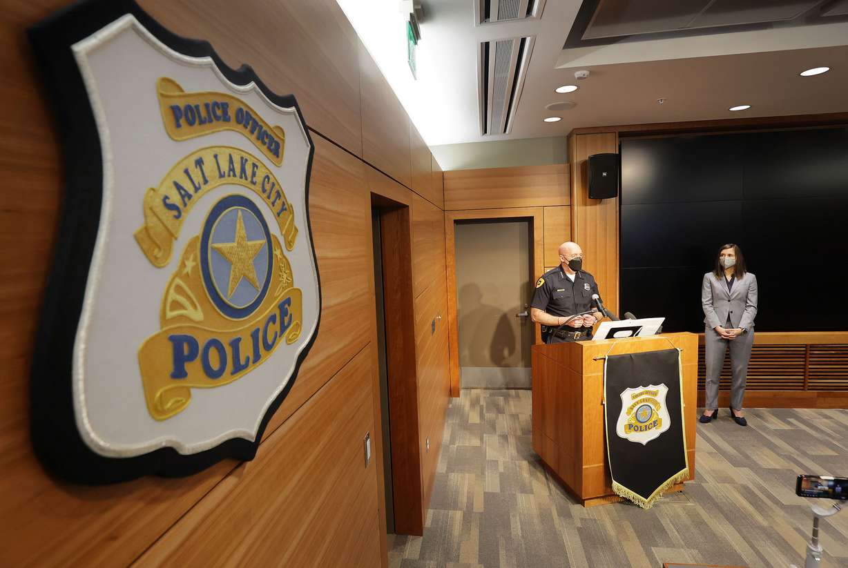 Salt Lake Police Chief Mike Brown discusses crime statistics and response times during a press conference at the Public Safety Building in Salt Lake City on Jan. 5, as Salt Lake City Mayor Erin Mendenhall looks on.