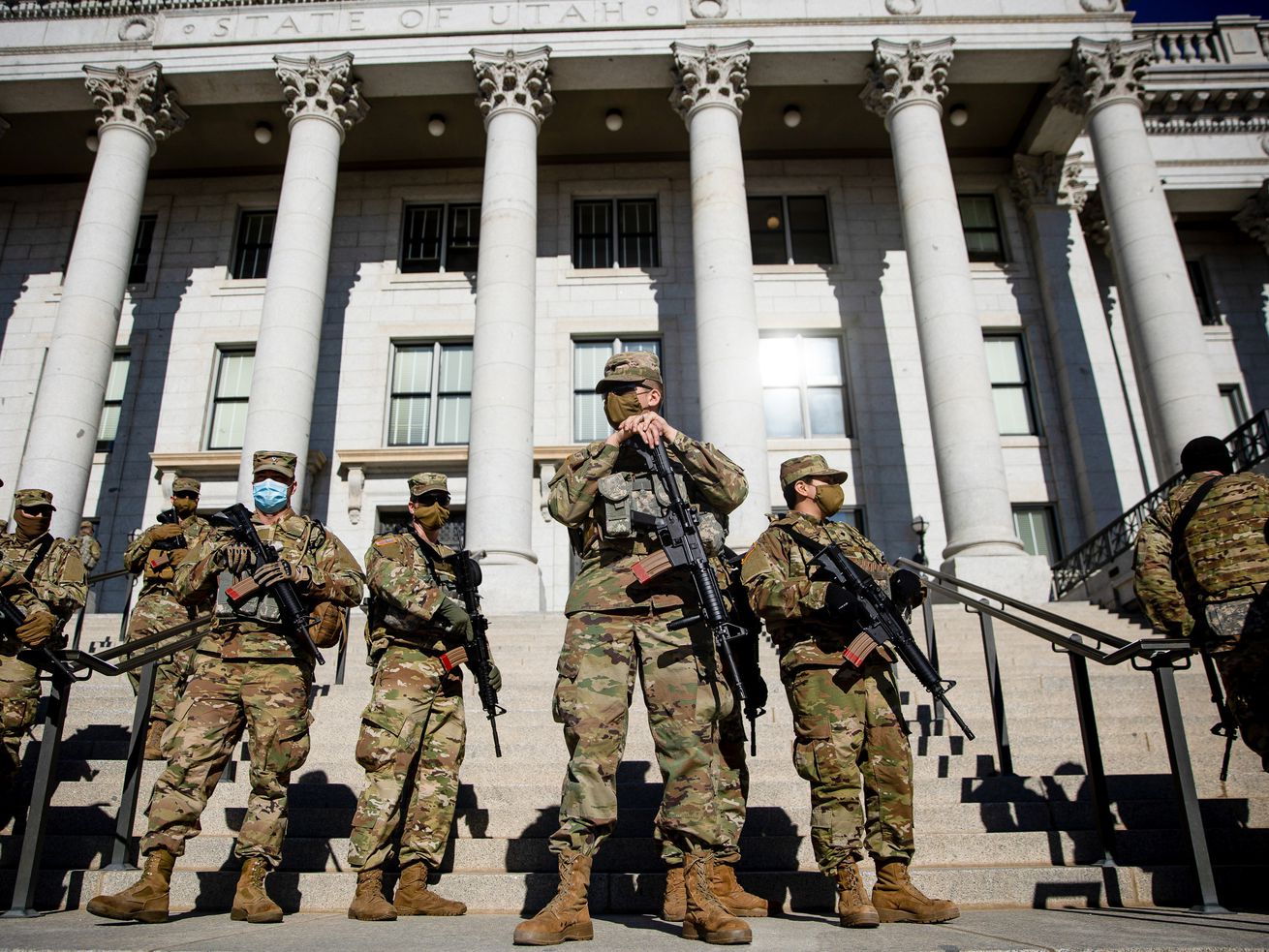 Utah National Guard soldiers are positioned at the Capitol for a protest in Salt Lake City on Sunday, Jan. 17, 2021.