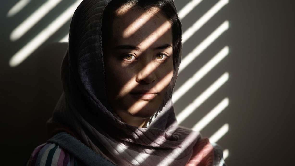 Afghan refugee Shazia Kakaie poses for a portrait at her house in North Salt Lake on Tuesday, Nov. 23, 2021. Following the Taliban takeover of Kabul, Afghanistan, Shazia was
separated from her husband, Azim. They were reunited in Utah on Oct. 30.
