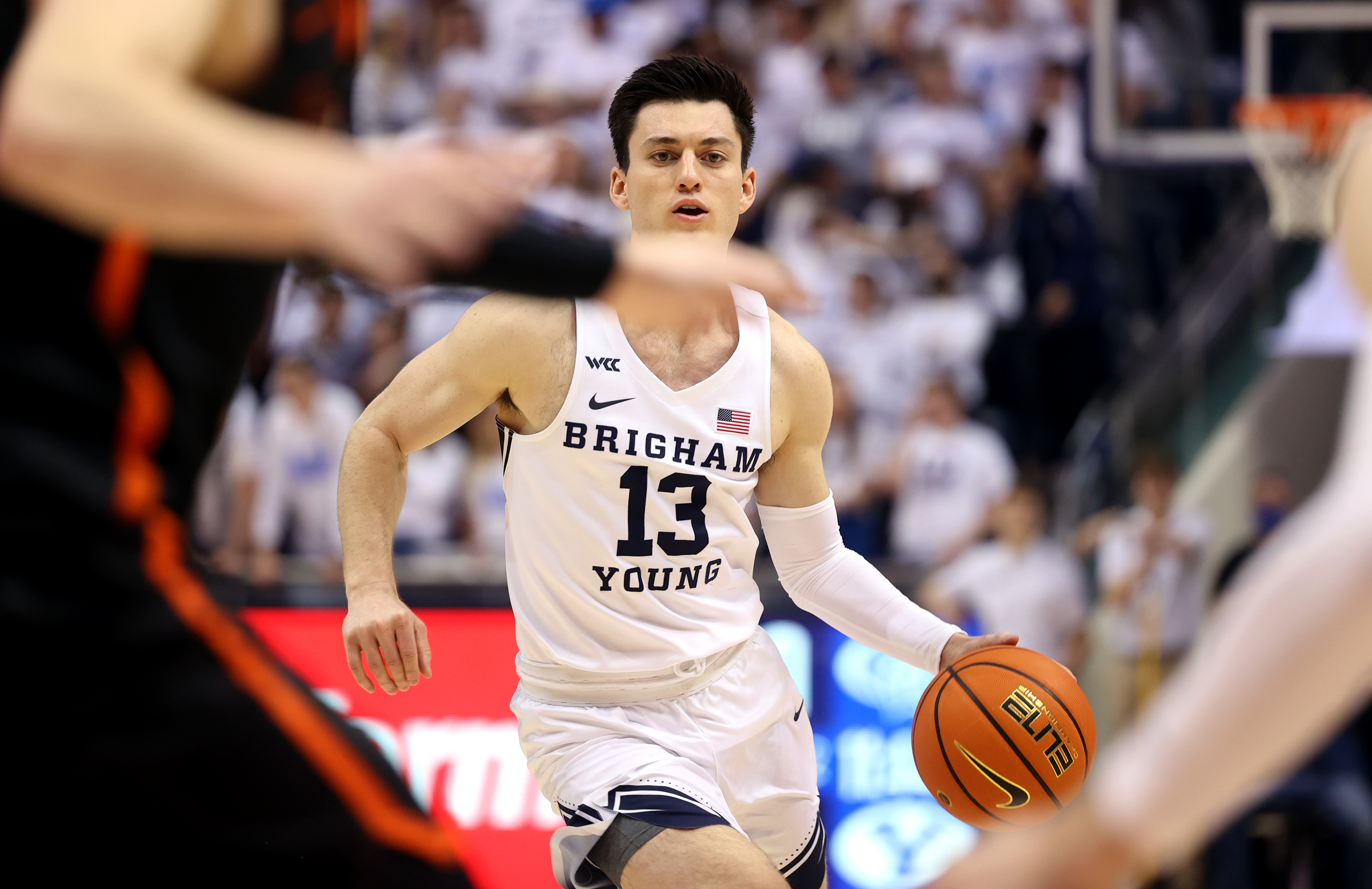 Brigham Young Cougars guard Alex Barcello (13) looks for an open teammate as BYU and Pacific play in an NCAA basketball game in Provo at the Marriott Center on Thursday, Jan. 6, 2022. BYU won 73-51.