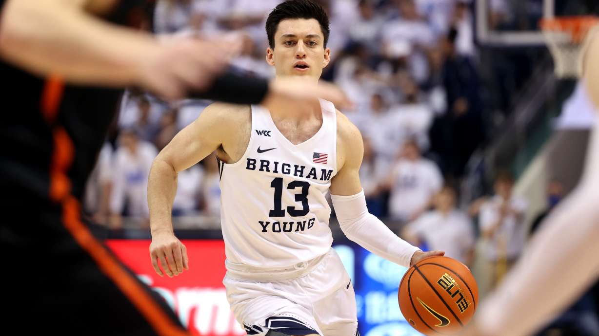 Brigham Young Cougars guard Alex Barcello (13) looks for an open teammate as BYU and Pacific play in an NCAA basketball game in Provo at the Marriott Center on Thursday, Jan. 6, 2022. BYU won 73-51.