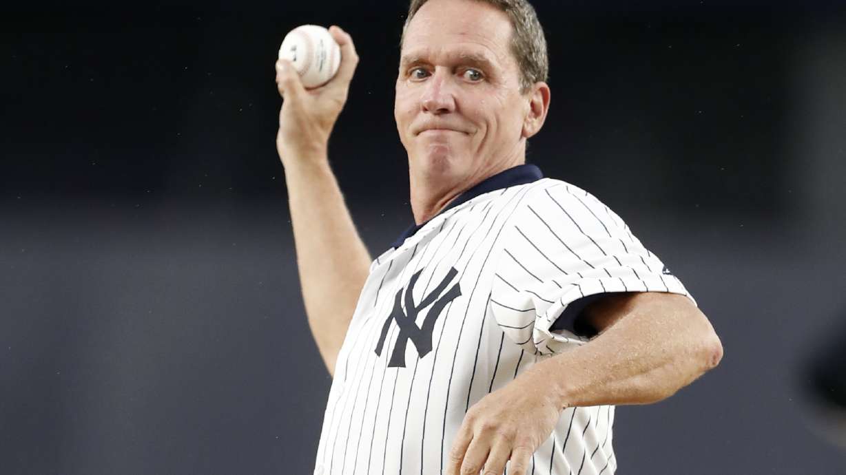 Former New York Yankees pitcher David Cone throws out a ceremonial first pitch for the second game of a baseball doubleheader between the Yankees and the Tampa Bay Rays on July 18, 2019, in New York. Cone, now a broadcaster, said Wednesday that he believes Salt Lake City is a frontrunner to receive an expansion MLB team.