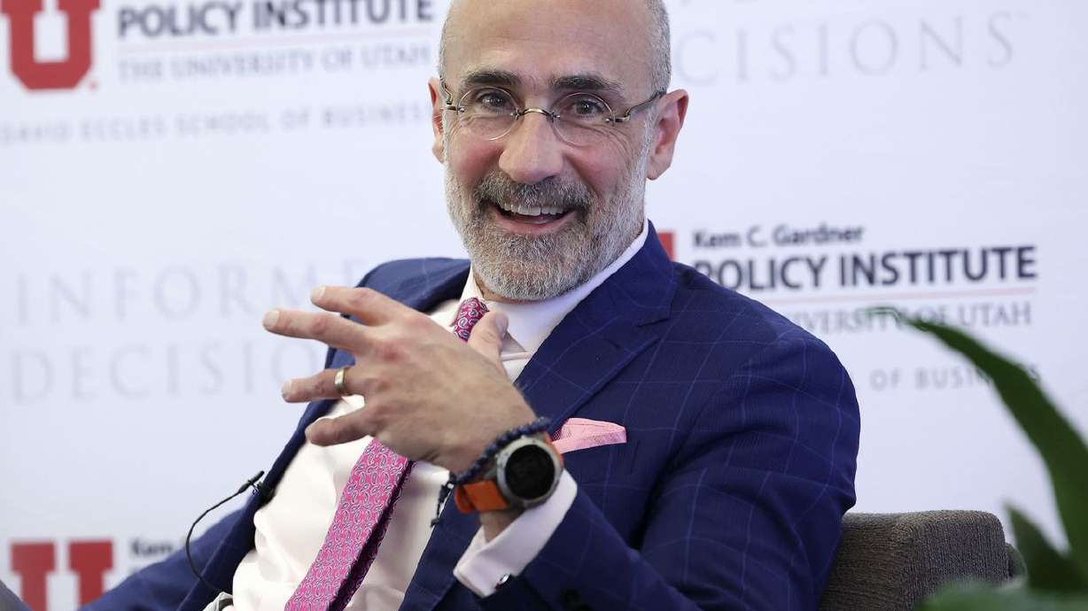 Arthur Brooks, the William Henry Bloomberg professor of the practice of public leadership at the Harvard Kennedy School and professor of management practice at the Harvard Business School, speaks at the Kem C. Gardner Policy Institute symposium at the Thomas S. Monson Center in Salt Lake City on Friday.