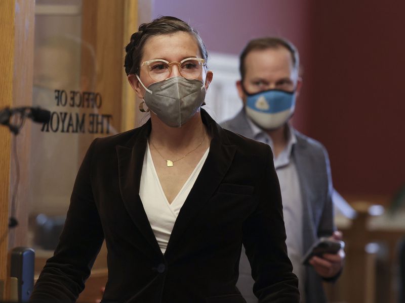 Salt Lake City Mayor Erin Mendenhall walks to the
podium for a press conference at the City-County Building on
Friday. Mendenhall asked the Salt Lake County Council
to enact a mask mandate amid "unprecedented” COVID-19 case
counts.