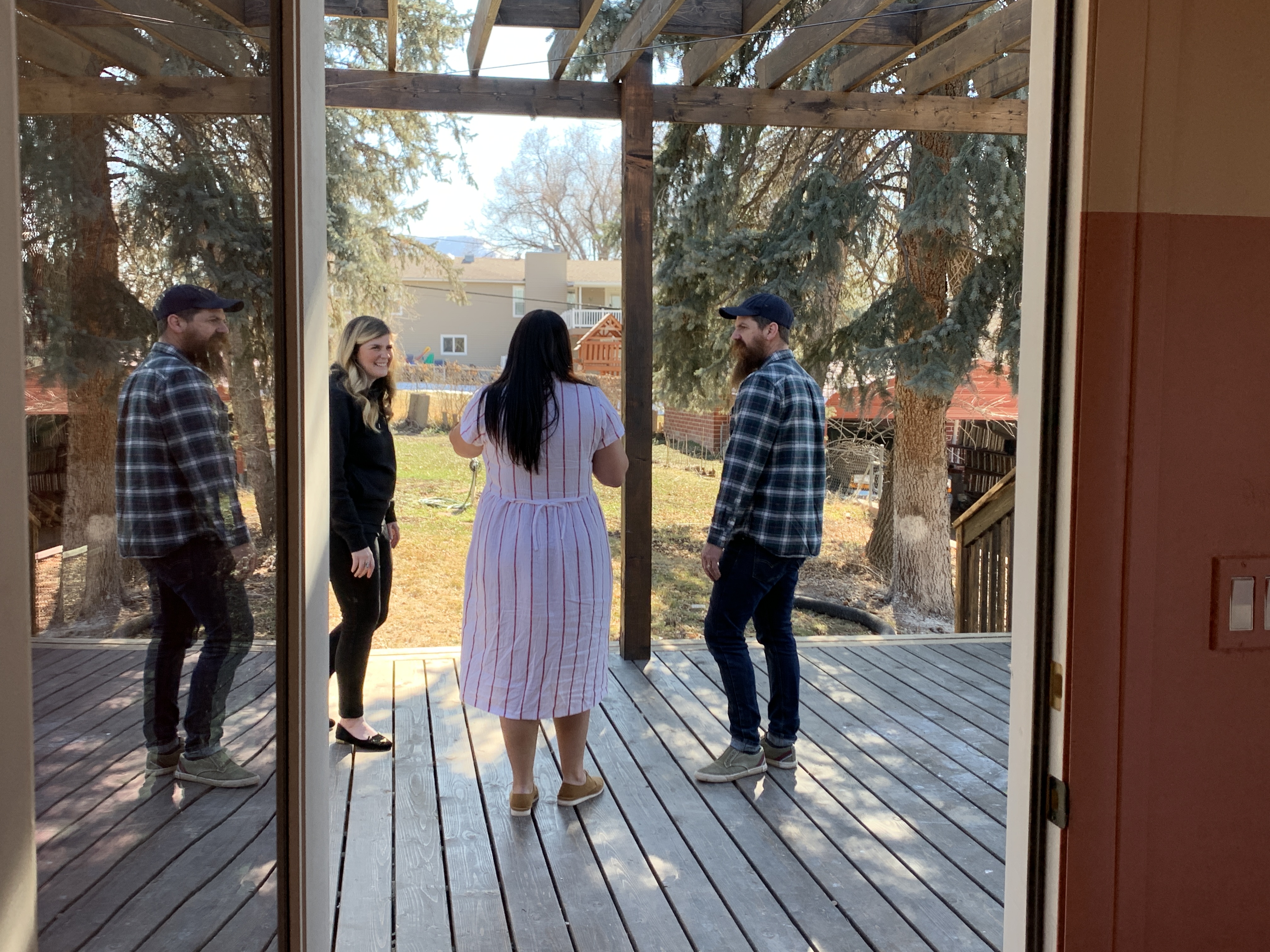Candis Meredith, left; Aubry Bennion, center; and Andy Meredith are pictured on Bennion's porch at her Bountiful home in this undated photo.
