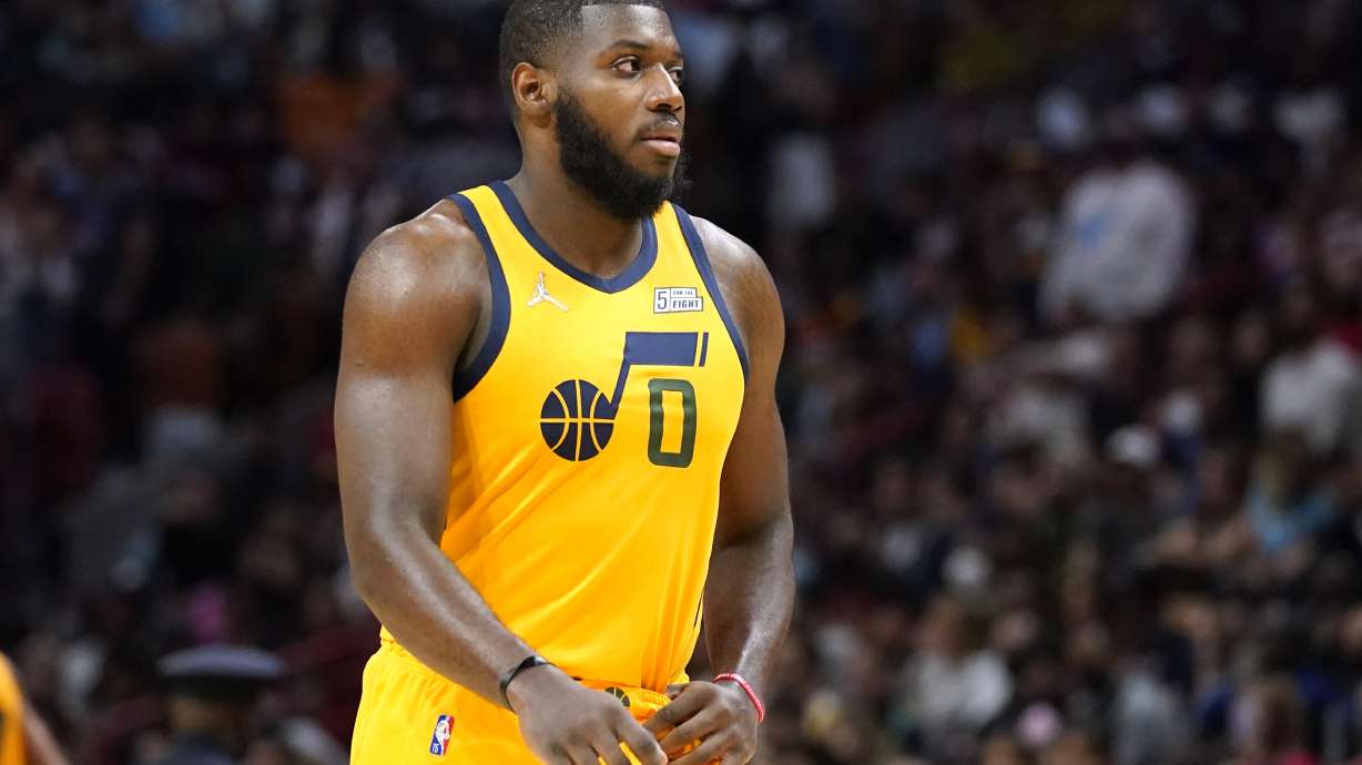 In this file photo Utah Jazz forward Eric Paschall (0) is in action during the second half of an NBA basketball game against the Miami Heat, Saturday, Nov. 6, 2021, in Miami. The Heat won 118-115.