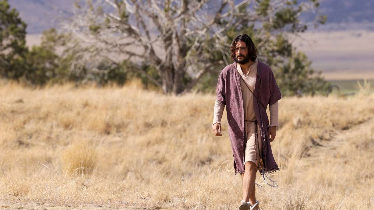 Jonathan Roumie, who plays Jesus, walks toward trailers during filming of a faith-based streaming series on the life of Jesus Christ called "The Chosen" at The Church of Jesus Christ of Latter-day Saints' Jerusalem set in Goshen, Utah County, on Monday, Oct. 19, 2020.