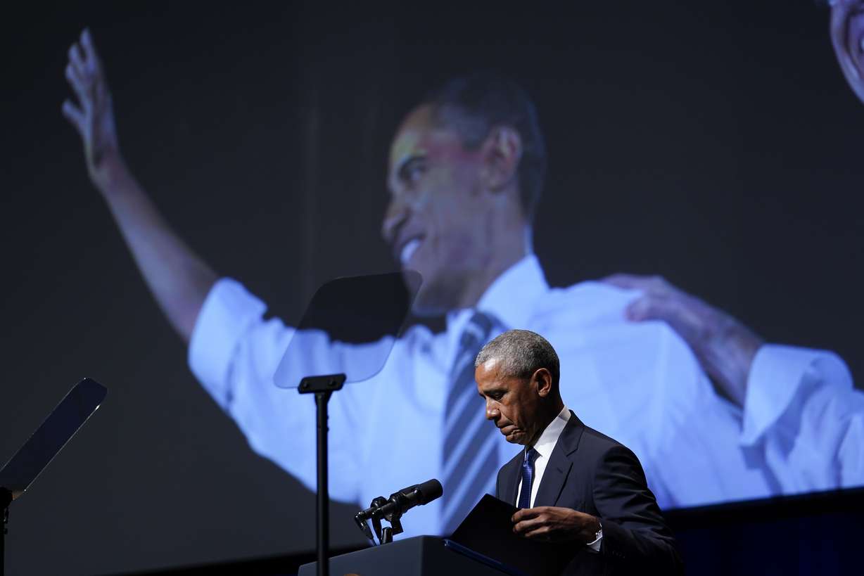 Former President Barack Obama pauses as he speaks during a memorial service for former Senate Majority Leader Harry Reid at the Smith Center in Las Vegas, Saturday.