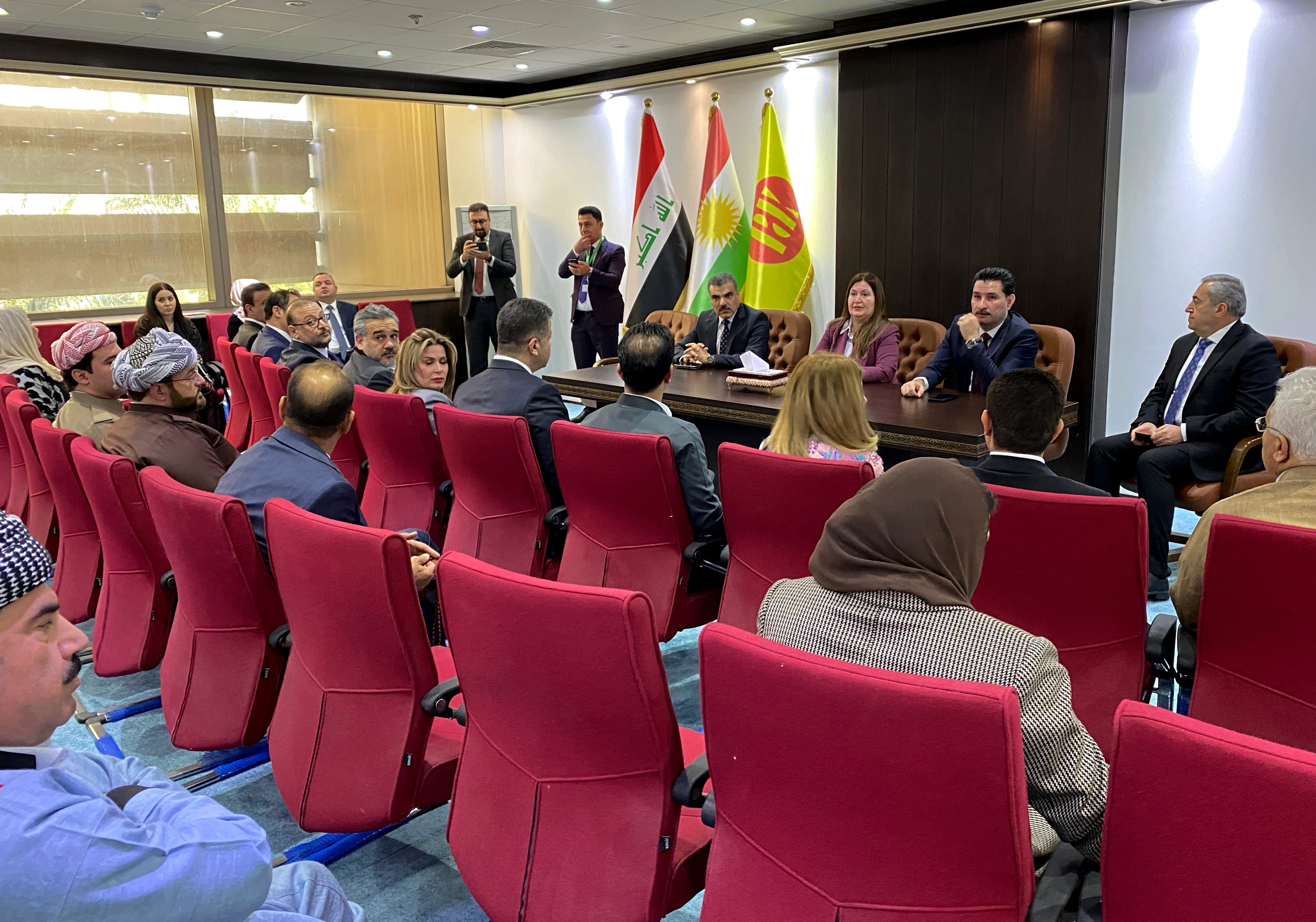 Newly elected lawmakers from Kurdistan hold a meeting before the first session of the Iraqi parliament, in Baghdad, Iraq, Sunday. Iraq's newly-elected parliament is expected to hold its first session on Sunday, nearly three months after Iraqis went to the polls in a national vote whose results have been contested by powerful Iran-backed factions.