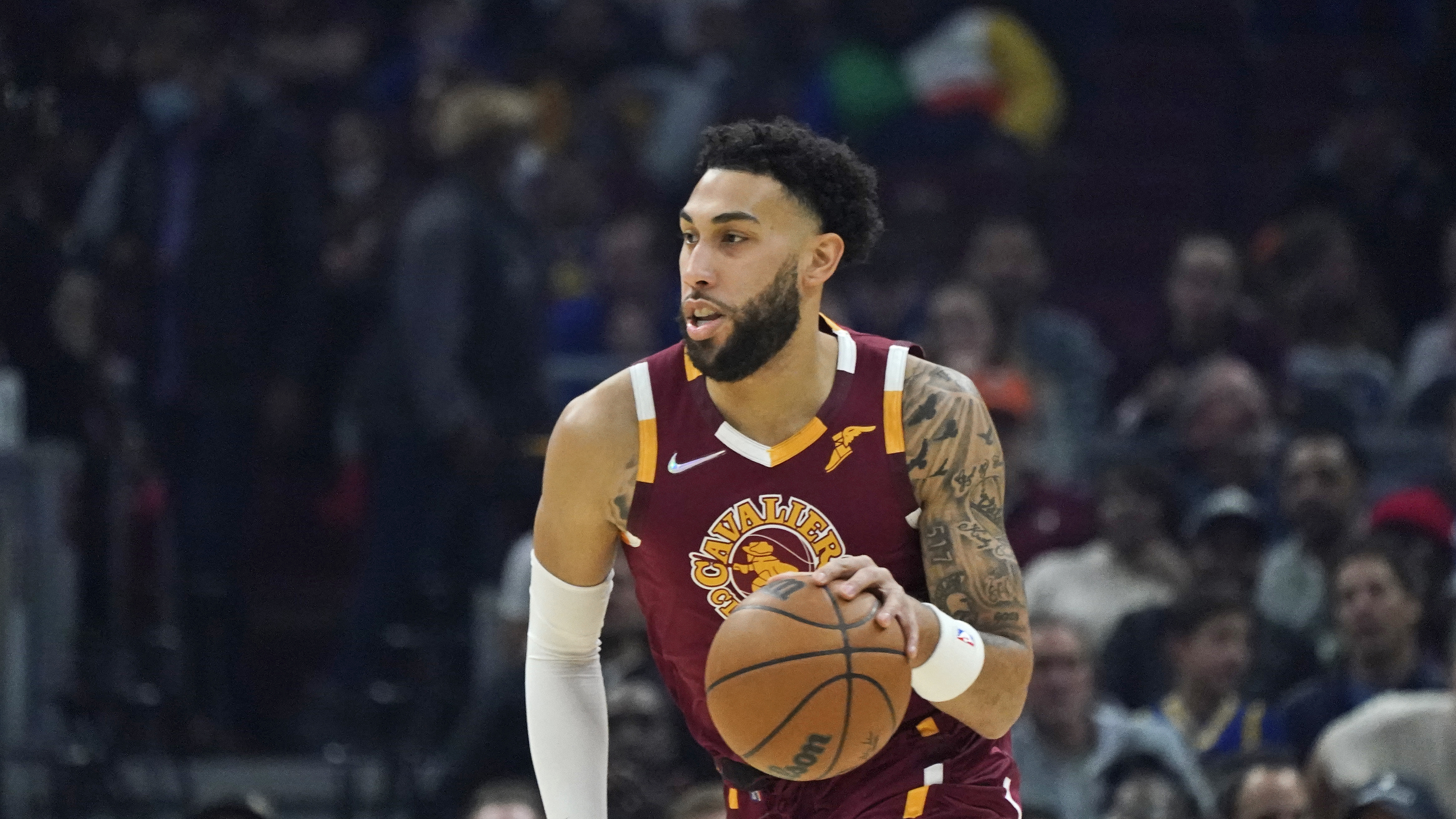 Cleveland Cavaliers' Denzel Valentine drives against the Golden State Warriors in the first half of an NBA basketball game, Thursday, Nov. 18, 2021, in Cleveland. 