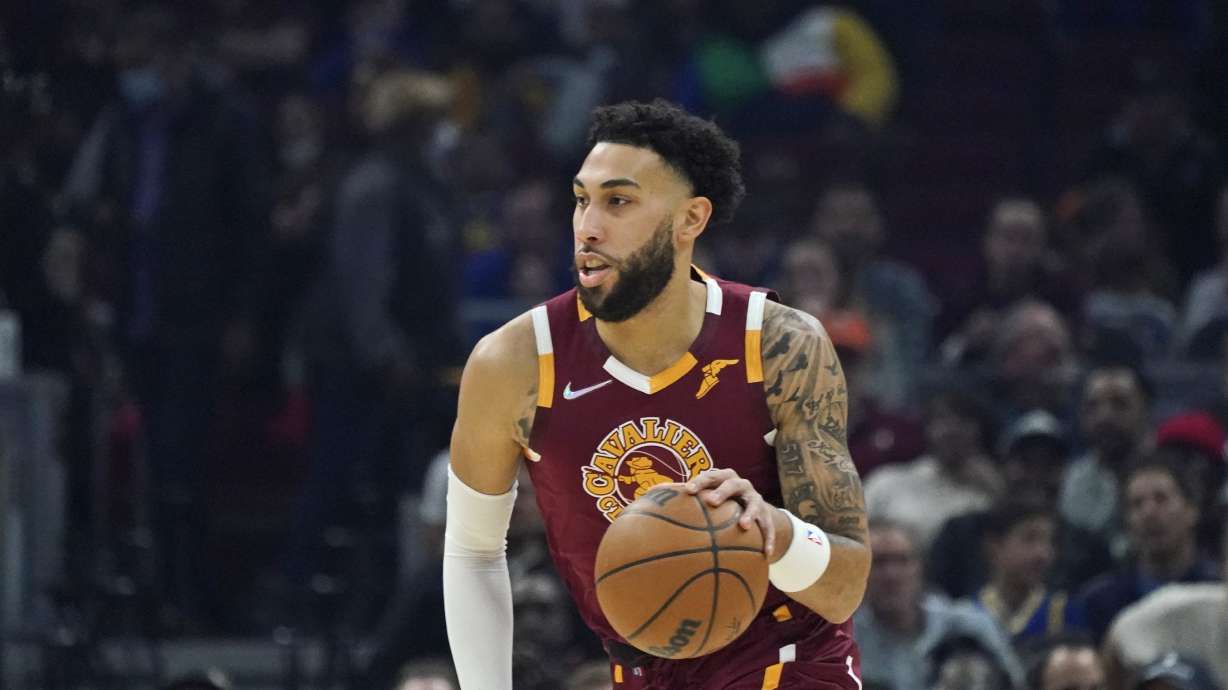 Cleveland Cavaliers' Denzel Valentine drives against the Golden State Warriors in the first half of an NBA basketball game, Thursday, Nov. 18, 2021, in Cleveland.