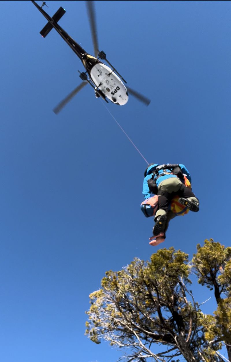 Utah Department of Public Safety officials hoist a victim with help from Washington County Search and Rescue on Monday. Deputies hikd in the last mile to reach a woman stuck in the snow in the Kolob Canyons region of Zion National Park.