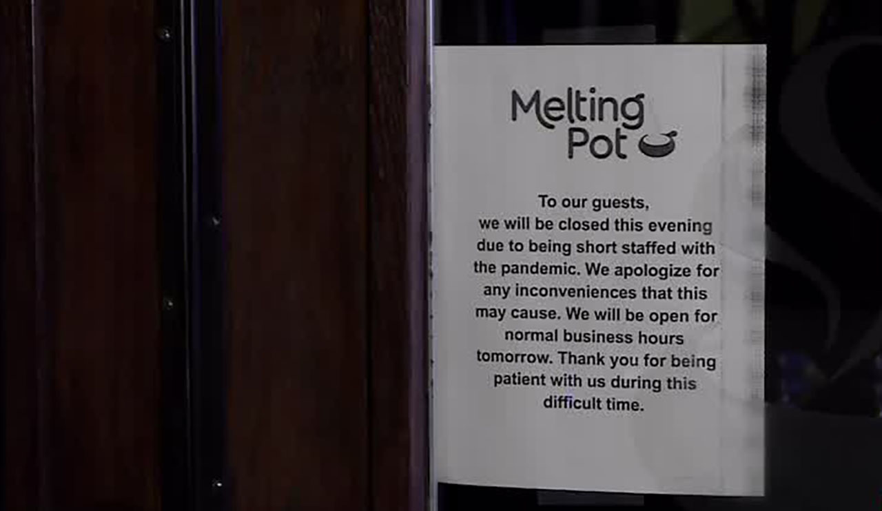The Melting Pot in Salt Lake City put a sign on their door Tuesday evening, indicating they had to close because of staffing shortages due to the pandemic.