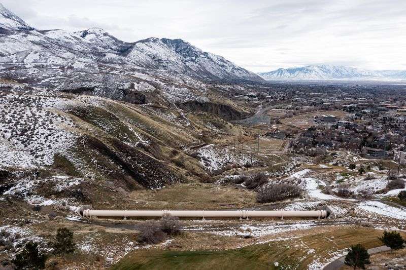 A section of the Alpine Aqueduct runs above ground where it crosses a fault in the hills above Orem on Thursday.