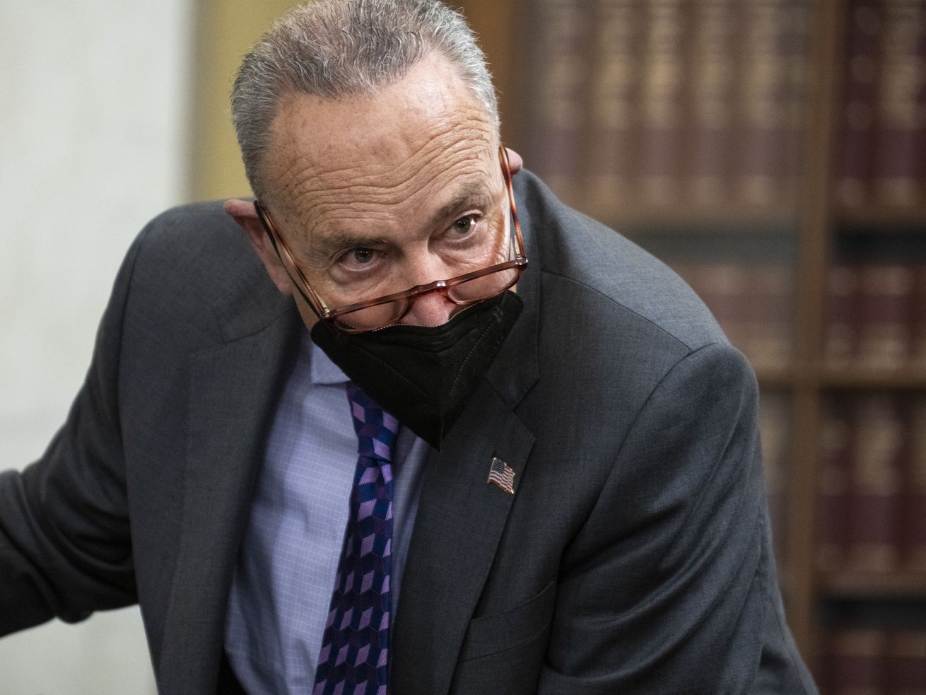 Senate Majority Leader Chuck Schumer of N.Y., arrives for a hearing on the Jan. 6, 2021, attack on the Capitol on Jan. 5 in Washington. Schumer blasted Utah Sen. Mitt Romney on Wednesday for comparing President Joe Biden to former President Donald Trump regarding elections.
