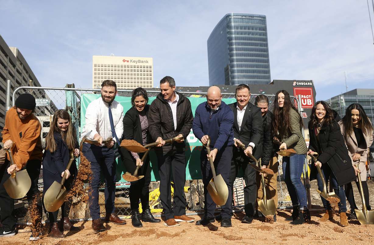 Civic and business leaders with Kensington Investment Company, HKS Architects, Jacobsen Construction Company and others pose for a photo during a groundbreaking ceremony for Astra Tower, a future 40-story building that will offer 372 luxury residences, in downtown Salt Lake City on Wednesday, Jan. 12, 2022.